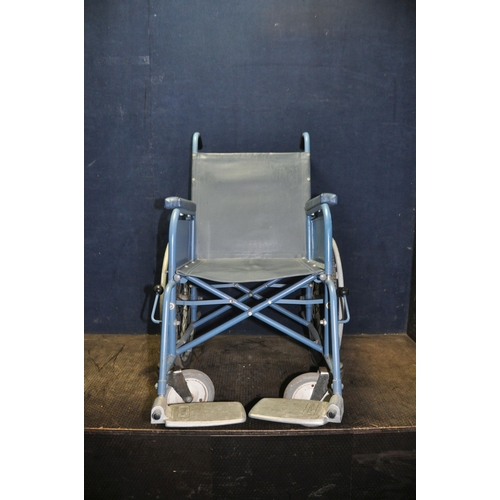 1052 - A VINTAGE VESSA WHEELCHAIR with two footrests