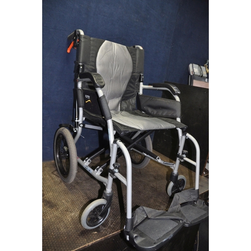 1053 - A KARMA ERGO LITE 2 MOBILITY FOLDING  WHEELCHAIR with two footrests