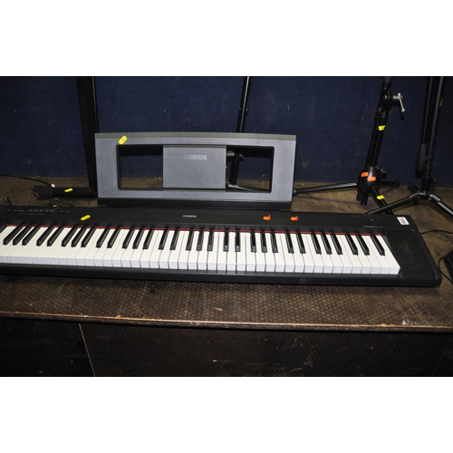 1056 - A YAMAHA PIAGGERO NP-32 ELECTRONIC PIANO with Rock Jam Sustain pedal, keyboard stand, instrument sta... 