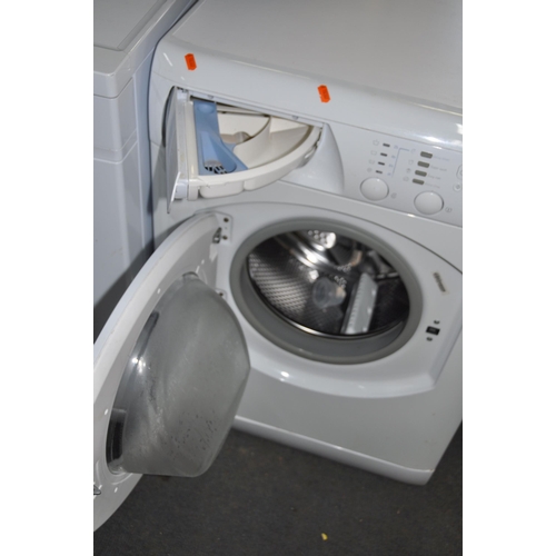 1075 - A HOTPOINT WF561P WASHING MACHINE width 60cm depth 55cm height 85cm (PAT pass, spin cycle run but no... 