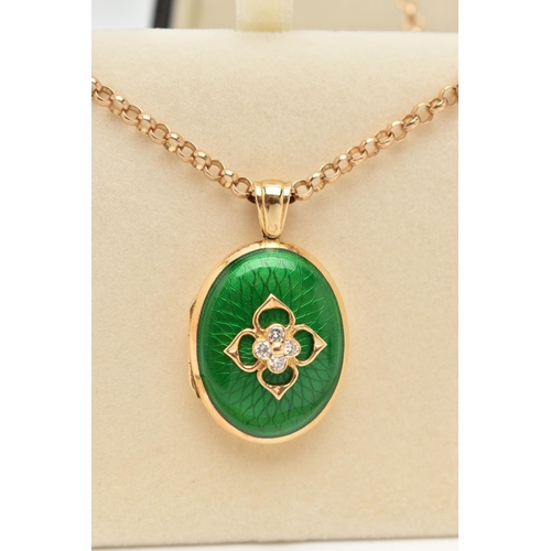 1 - AN 18CT GOLD DIAMOND AND ENAMEL LOCKET, the oval locket with green enamel front, a quatrefoil design... 