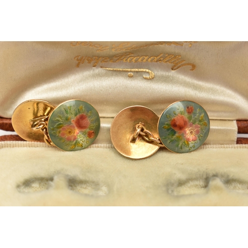 2 - A PAIR OF ENAMEL CUFFLINKS, designed as circular panels with floral enamel decoration and chain link... 