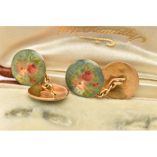 2 - A PAIR OF ENAMEL CUFFLINKS, designed as circular panels with floral enamel decoration and chain link... 