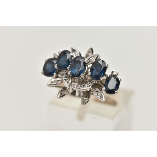 20 - A WHITE METAL SAPPHIRE AND DIAMOND DRESS RING, set with five oval cut blue sapphires, single cut dia... 