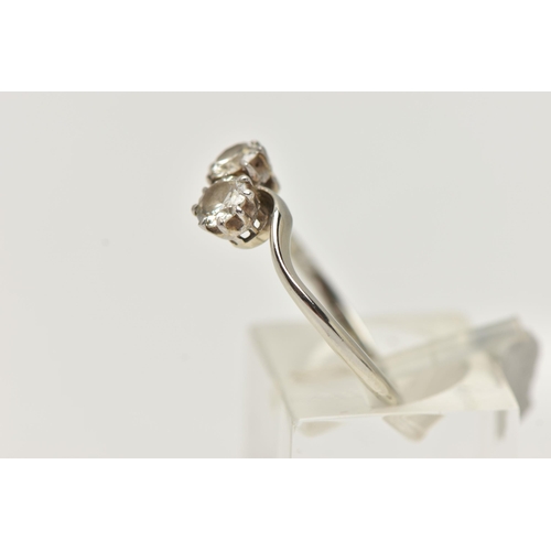 23 - A DIAMOND TWO STONE RING, an old cut diamond, measuring approximately 4.8mm x 4.9mm x 2.3mm, claw se... 