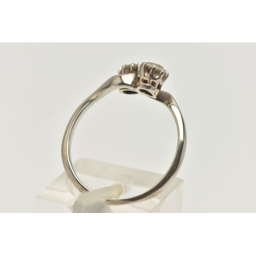 23 - A DIAMOND TWO STONE RING, an old cut diamond, measuring approximately 4.8mm x 4.9mm x 2.3mm, claw se... 