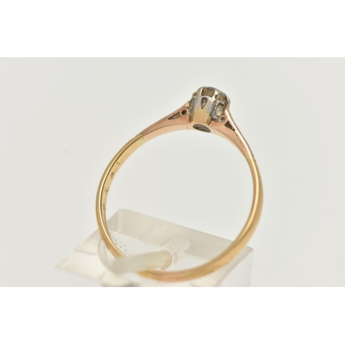 27 - A YELLOW METAL DIAMOND SINGLE STONE RING, set with a round brilliant cut diamond, claw set, estimate... 