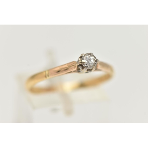 27 - A YELLOW METAL DIAMOND SINGLE STONE RING, set with a round brilliant cut diamond, claw set, estimate... 