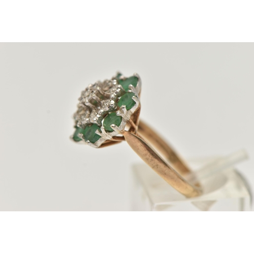 29 - A 9CT GOLD EMERALD AND DIAMOND CLUSTER RING, tiered cluster set with nine illusion set single cut di... 