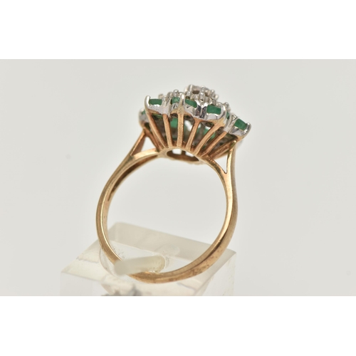 29 - A 9CT GOLD EMERALD AND DIAMOND CLUSTER RING, tiered cluster set with nine illusion set single cut di... 