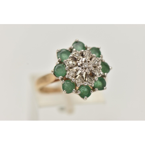 29 - A 9CT GOLD EMERALD AND DIAMOND CLUSTER RING, tiered cluster set with nine illusion set single cut di... 