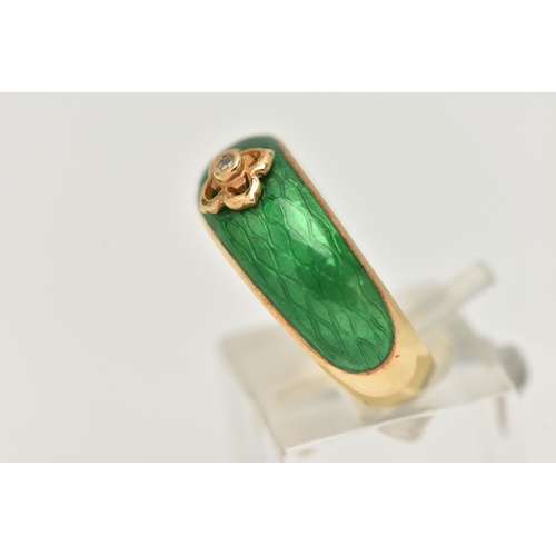 3 - AN 18CT GOLD ENAMEL AND DIAMOND RING, the tapered band with green enamel to the front, a quatrefoil ... 