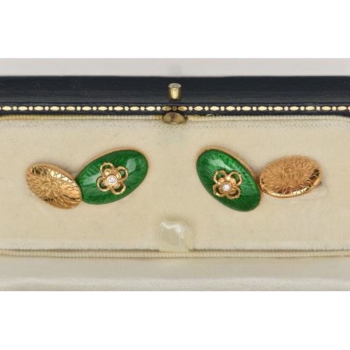 4 - A PAIR OF 18CT GOLD ENAMEL AND DIAMOND CUFFLINKS, each designed as an oval green enamel panel with c... 