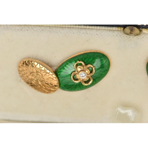 4 - A PAIR OF 18CT GOLD ENAMEL AND DIAMOND CUFFLINKS, each designed as an oval green enamel panel with c... 