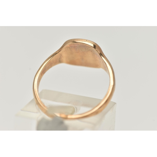 44 - A 9CT GOLD SIGNET RING, rounded square form, with foliate pattern, tapering polished band, hallmarke... 