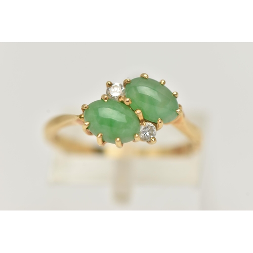 5 - AN 18CT GOLD JADE AND DIAMOND RING, of crossover  design, claw set horizontally with two oval jade c... 