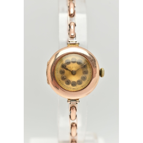 55 - TWO LADIES 9CT GOLD WRISTWATCHES, the first a manual wind watch, worn two tone dial, polished case, ... 