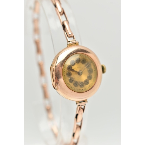 55 - TWO LADIES 9CT GOLD WRISTWATCHES, the first a manual wind watch, worn two tone dial, polished case, ... 