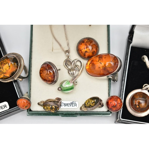 82 - A SMALL ASSORTMENT OF WHITE METAL JEWELLERY, to include a pair of white metal amber cabochon stud ea... 