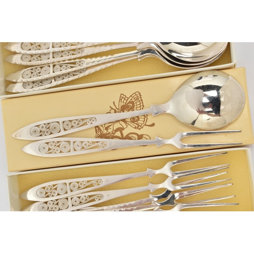 108 - A SELECTION OF CONTINENTAL WHITE METAL CUTLERY, to include six spoons and six forks, with wire scrol... 