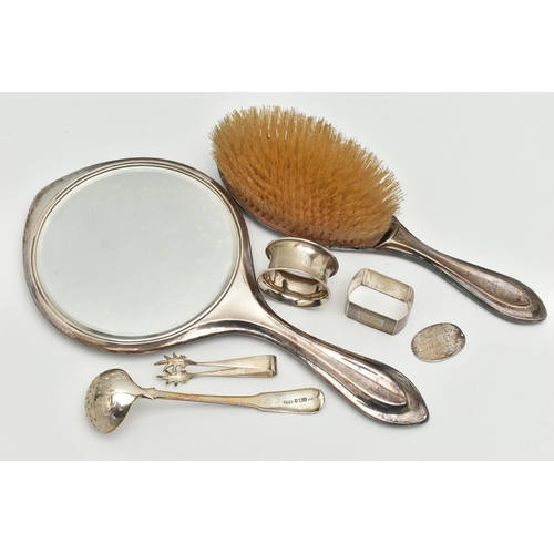 111 - A SMALL ASSORTMENT OF SILVER, to include a hand held mirror and hair brush, hallmark rubbed Birmingh... 