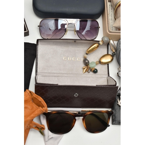 130 - A BOX OF ASSORTED ITEMS, to include a pair of 'Ray Ban' Wayfarer 2140 sunglasses, a pair of Gucci GG... 