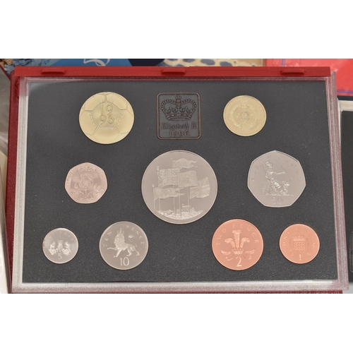 140 - A BOX CONTAINING UK AND WORLD COIN YEAR SETS, to include a 1996 De-Lux Year set, UK Proof sets 1981,... 