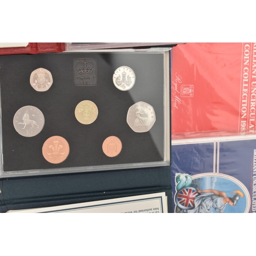 140 - A BOX CONTAINING UK AND WORLD COIN YEAR SETS, to include a 1996 De-Lux Year set, UK Proof sets 1981,... 