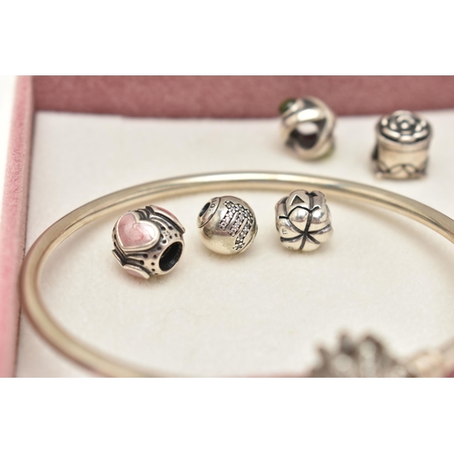 93 - PANDORA' CHARMS AND BOX WITH BANGLE, to include six white metal charms, all stamped '925S ALE', with... 