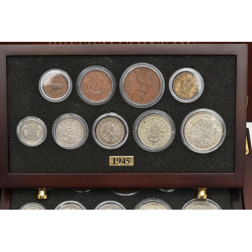 154 - A SMALL WOODEN COIN CABINET, consisting of eight drawers seven containing UK coinage from 1939-1945,... 