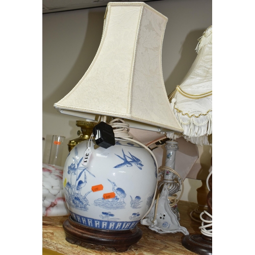 311 - A GROUP OF TABLE LAMPS AND TWO 1930S GLASS 'FLYCATCHER' LIGHT SHADES, comprising a mottled orange an... 