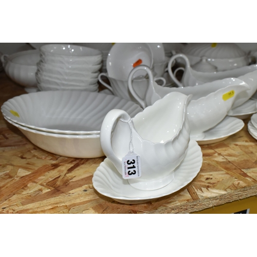 313 - A QUANTITY OF WEDGWOOD 'CANDLELIGHT' DESIGN DINNERWARE, comprising three gravy/sauce jugs and stands... 