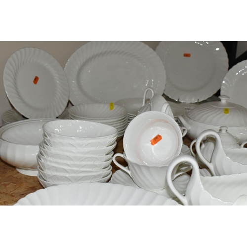 313 - A QUANTITY OF WEDGWOOD 'CANDLELIGHT' DESIGN DINNERWARE, comprising three gravy/sauce jugs and stands... 