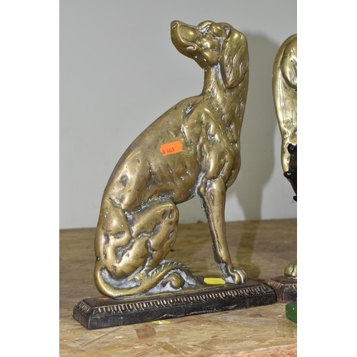 324 - A CAST IRON FIGURE OF BETTY BOOP AND A PAIR OF BRASS SPANIEL DOORSTOPS, the painted shelf sitting Be... 