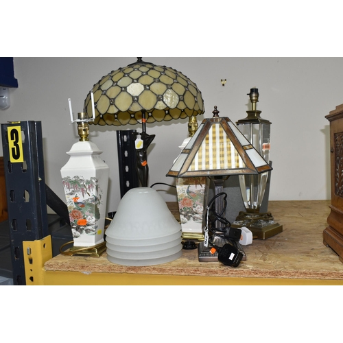 326 - A GROUP OF TABLE LAMPS, comprising a modern figural lamp with leaded effect shade, total height appr... 