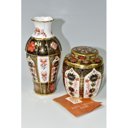 344 - A ROYAL CROWN DERBY 'OLD IMARI' 1128 PATTERN SOLID BAND COVERED GINGER JAR AND VASE, comprising vase... 