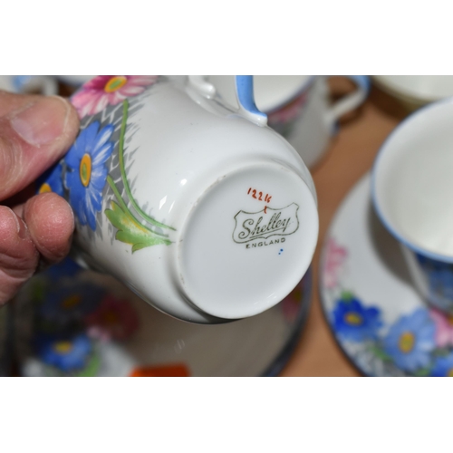 359 - A SHELLEY COFFEE SET, pattern number 12216, decorated with a blue and pink floral design on a white ... 