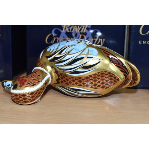 374 - A BOXED ROYAL CROWN DERBY 'COLLECTORS GUILD DUCK' PAPERWEIGHT, with gold stopper, red printed backst... 