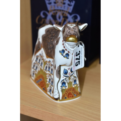 375 - A BOXED ROYAL CROWN DERBY 'BLUEBELL CALF' PAPERWEIGHT, with gold stopper, red printed backstamp and ... 