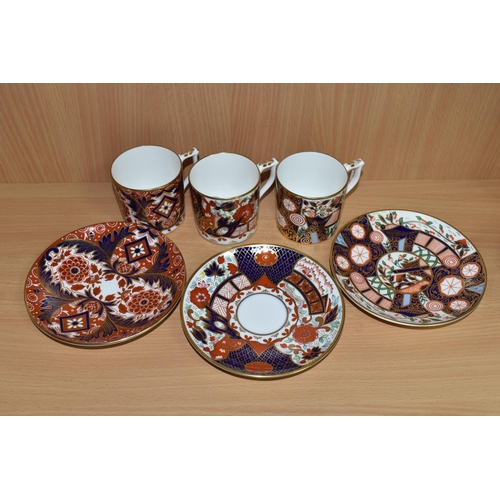 380 - THREE ROYAL CROWN DERBY COFFEE CANS AND SAUCERS, from 'The Curator's Collection' in Rich Japan, Derb... 