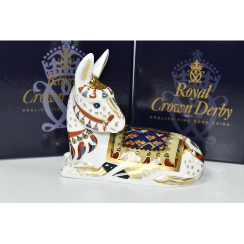 392 - TWO BOXED ROYAL CROWN DERBY PAPERWEIGHTS, comprising Thistle Donkey and Llama, the latter a Royal Cr... 