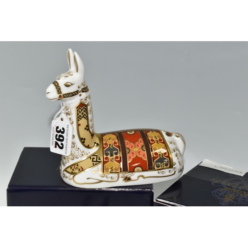 392 - TWO BOXED ROYAL CROWN DERBY PAPERWEIGHTS, comprising Thistle Donkey and Llama, the latter a Royal Cr... 