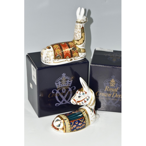 392 - TWO BOXED ROYAL CROWN DERBY PAPERWEIGHTS, comprising Thistle Donkey and Llama, the latter a Royal Cr... 