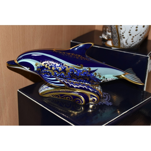 396 - TWO BOXED ROYAL CROWN DERBY PAPERWEIGHTS, comprising Russian Walrus and Bottlenose Dolphin, each wit... 