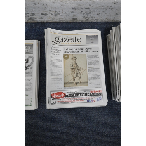 1225 - A BOX CONTAINING A LARGE COLLECTION OF 'ANTIQUES TRADE GAZETTE' MAGAZINES, to include seven copies f... 