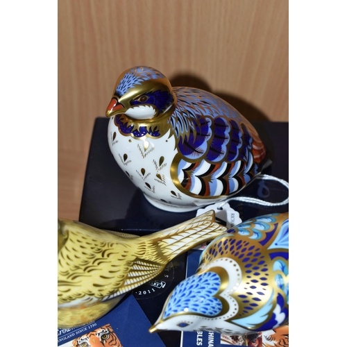 411 - THREE BOXED ROYAL CROWN DERBY PAPERWEIGHTS, 'Red Legged Partridge', 'Mountain Bluebird' and 'Canary'... 