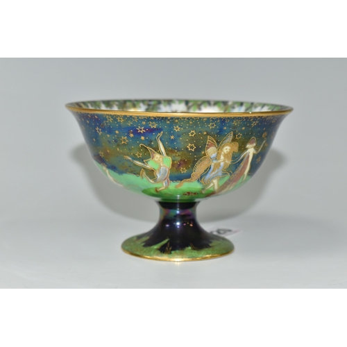 420 - A WEDGWOOD FAIRYLAND LUSTRE FOOTED BOWL,  decorated with a mother of pearl lustre with fairies in va... 