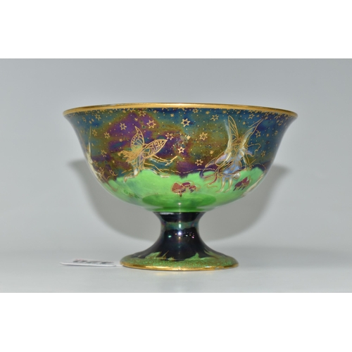 420 - A WEDGWOOD FAIRYLAND LUSTRE FOOTED BOWL,  decorated with a mother of pearl lustre with fairies in va... 