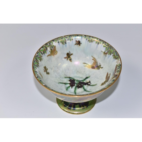 420 - A WEDGWOOD FAIRYLAND LUSTRE FOOTED BOWL,  decorated with a mother of pearl lustre with fairies in va... 