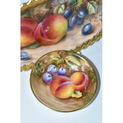 423 - TWO ROYAL WORCESTER TRINKET DISHES, comprising an oval trinket dish decorated with fallen fruit and ... 